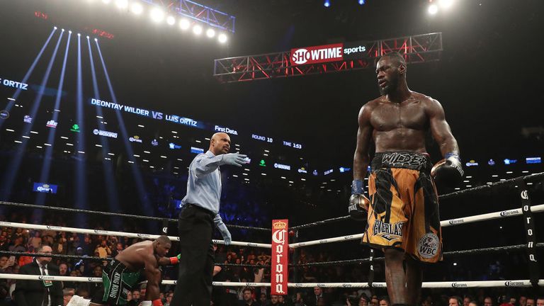 NEW YORK, NY - MARCH 03:  Deontay Wilder walks to a neutral corner after Luis Ortiz goes down but it was ruled a slip during their WBC Heavyweight Championship fight at Barclays Center on March 3, 2018 in the Brooklyn Borough of New York City.  (Photo by Al Bello/Getty Images)