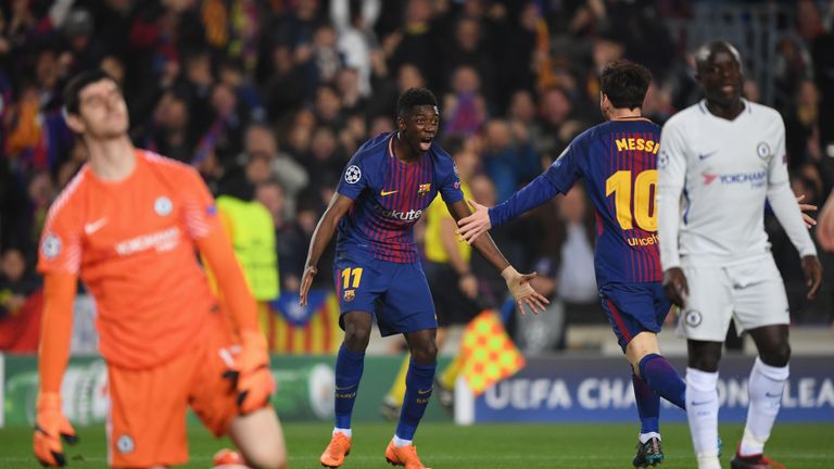 Ousmane Dembele celebrates with Lionel Messi after scoring Barcelona's second goal as Thibaut Courtois and N'Golo Kante look dejected