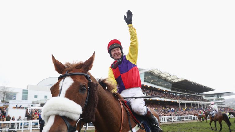 Richard Johnson on Native River celebrates after winning the Timico Cheltenham Gold Cup Chase at the Cheltenham Festival