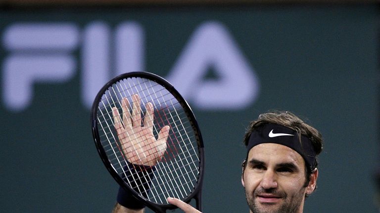 Roger Federer Switzerland celebrates after defeating Hyeon Chung of Korea during Day 11 of BNP Paribas Open on March 15, 2018 in Indian Wells, California.