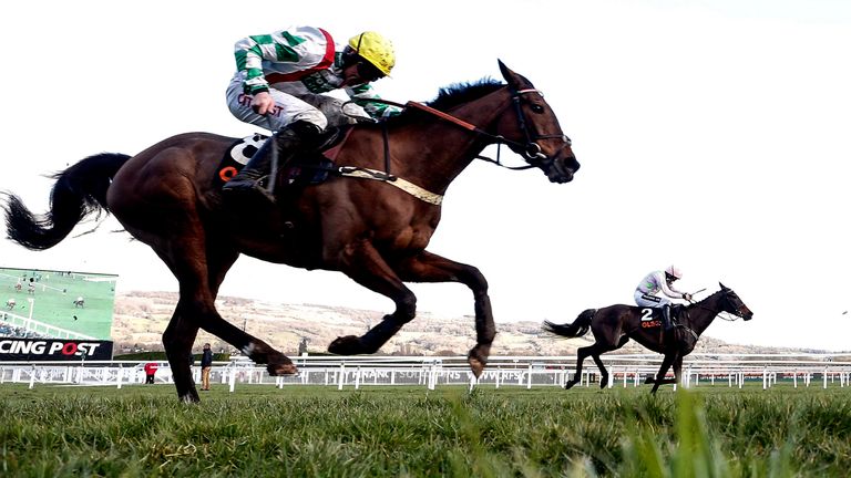 Ruby Walsh riding Benie Des Dieux (R) win The OLBG Mares' Hurdle Race from Midnight Tour on Champion Day at Cheltenham Festival