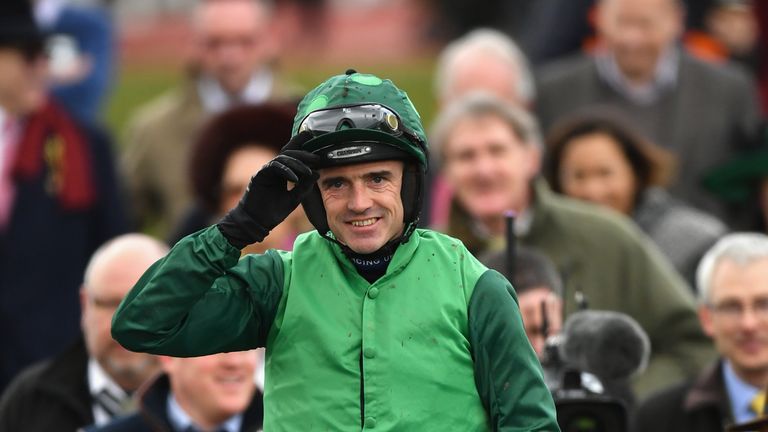 Ruby Walsh riding Footpad celebrates victory in the Racing Post Arkle Challenge Trophy Novices' Chase on Champion Day of the Cheltenham Festival at Cheltenham Racecourse on March 13, 2018