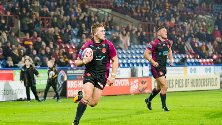 James Greenwood goes on to score a try against Huddersfield.