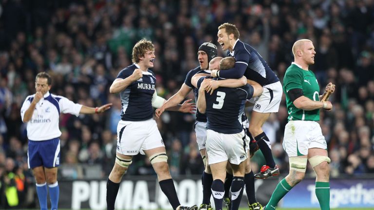 Richie Gray, Kelly Brown, Euan Murray and Dan Parkes celebrate after Scotland's win over Ireland at Croke Park in the 2010 Six Nations