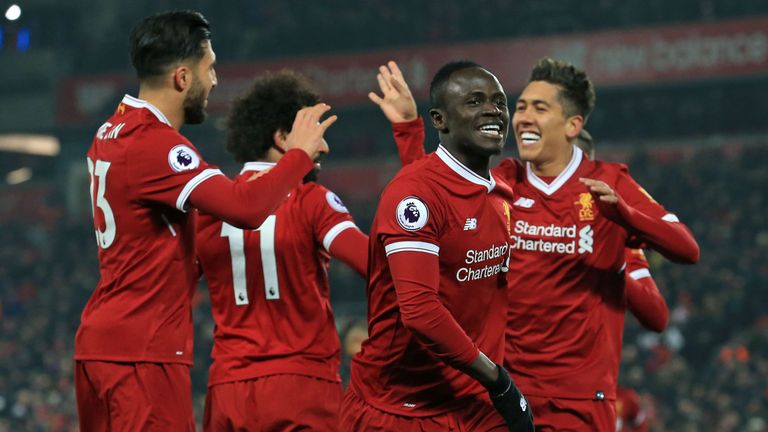 Sadio Mane celebrates his goal with teammates during the Premier League match between Liverpool and Newcastle United at Anfield