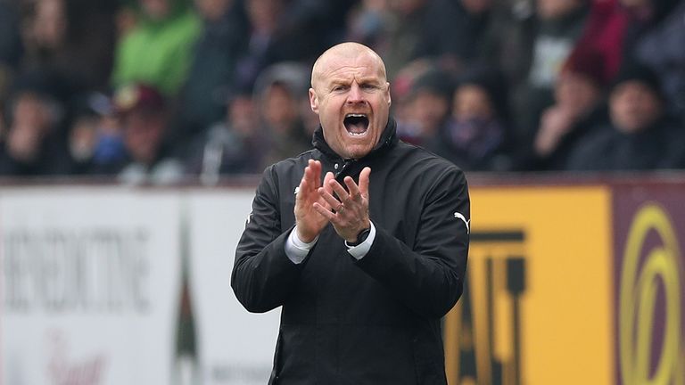 Burnley boss Sean Dyche applauds on the sidelines