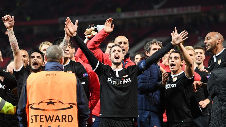 Sevilla celebrate their win over Manchester United at Old Trafford