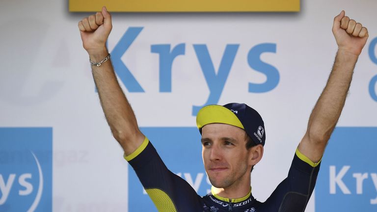 Great Britain's Simon Yates celebrates his white jersey of best young on the podium at the end of the 222,5 km nineteenth stage of the 104th edition of the Tour de France cycling race on July 21, 2017 between Embrun and Salon-de-Provence. / AFP PHOTO / Lionel BONAVENTURE (Photo credit should read LIONEL BONAVENTURE/AFP/Getty Images)