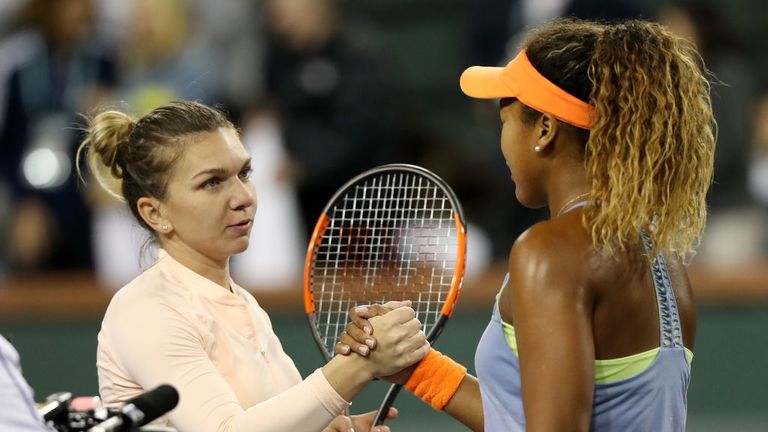 Simona Halep of Romania congratulates Naomi Osaka of Japan after their match during semifinals of the BNP Paribas Open at the Indian Wells Tennis Garden on March 16, 2018 in Indian Wells, California