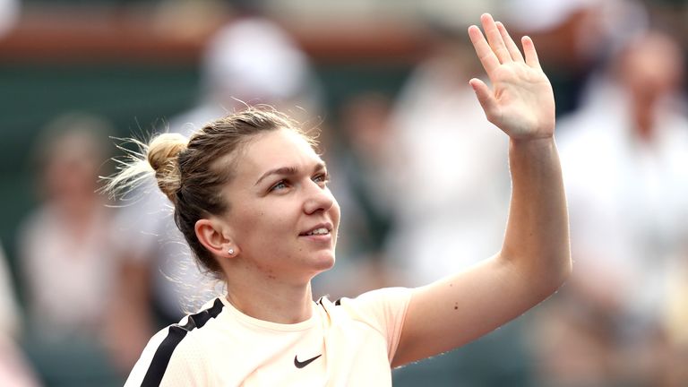 Simona Halep of Romania celebrates her win over Kristyna Pliskova of Czech Republic during the BNP Paribas Open at the Indian Wells Tennis Garden on March 9, 2018 in Indian Wells, California