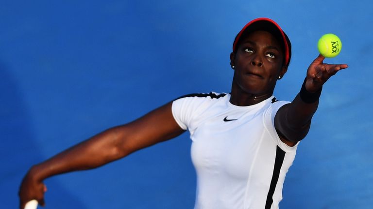 Sloane Stephens serves to Netherland's Arantxa Rus (out of frame) during their Mexico WTA Open women's singles tennis match in Acapulco