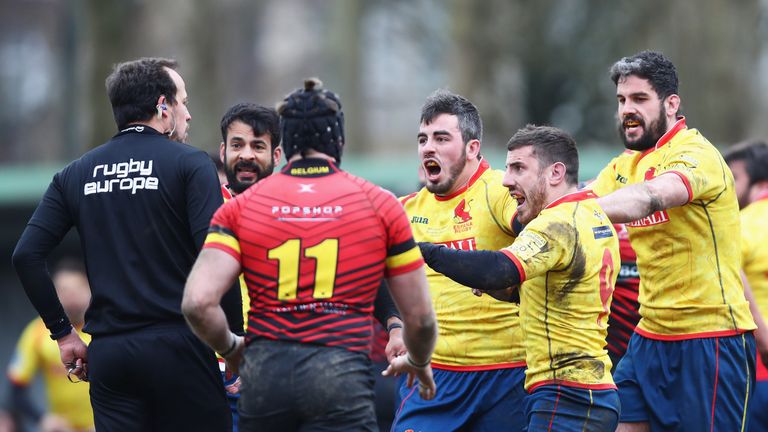 Players from Spain, including Guillaume G Rouet, confront the referee after defeat in the Rugby World Cup 2019 Europe Qualifier match against Belgium in Brussels on March 18, 2018