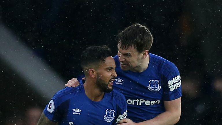 Theo Walcott and Seamus Coleman during the Premier League match between Everton and Brighton and Hove Albion at Goodison Park 