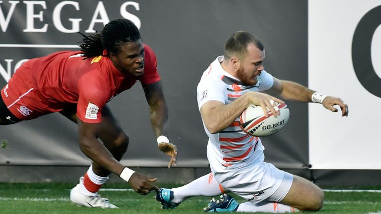 England's Tom Bowen touches down against Canada