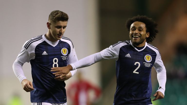 EDINBURGH, SCOTLAND - MARCH 22:  Tom Cairney and Ikechi Anya of Scotland celebrates scotlands' only goal during the International Challenge Match between Scotland and Canada at Easter Road on March 22, 2017 in Edinburgh, Scotland. (Photo by Ian MacNicol/Getty Images)