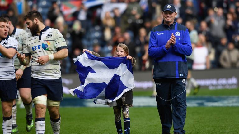 Vern Cotter on a lap of the ground after his last game in charge of Scotland