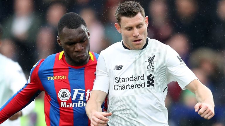 Crystal Palace's Christian Benteke (left) and Liverpool's James Milner battle for the ball during the Premier League match at Selhurst Park, London.