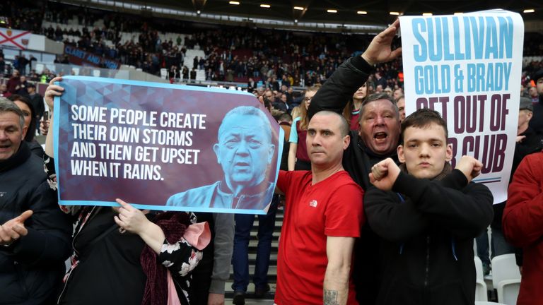 West Ham fans protest during the game against Burnley