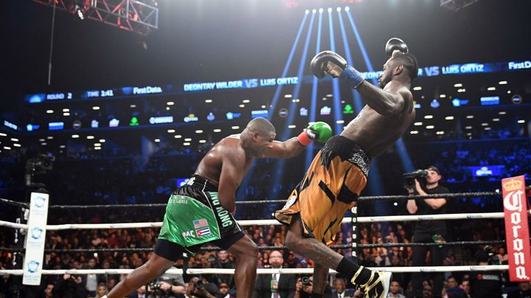 Heavyweight champion Deontay Wilder (R) of the US fights contender Luis Ortiz of Cuba during their WBC heavyweight title fight in New York on March 3, 2018. / AFP PHOTO / Timothy A. CLARY        (Photo credit should read TIMOTHY A. CLARY/AFP/Getty Images)