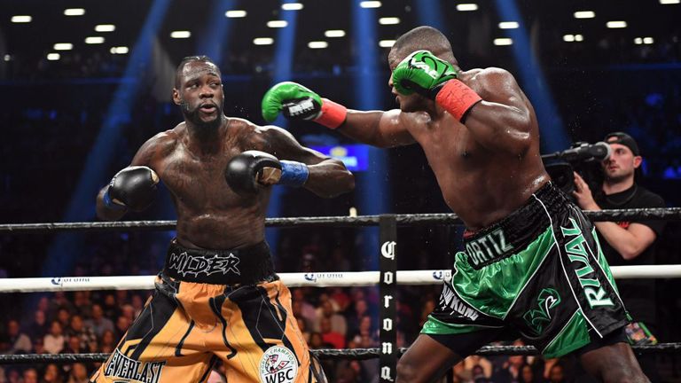 Heavyweight champion Deontay Wilder of the US fights contender Luis Ortiz of Cuba during their WBC heavyweight title fight in New York on March 3, 2018. / AFP PHOTO / Timothy A. CLARY        (Photo credit should read TIMOTHY A. CLARY/AFP/Getty Images)