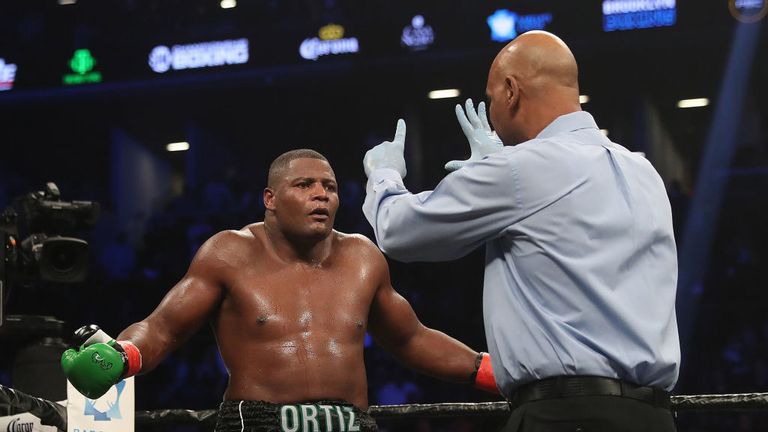 NEW YORK, NY - MARCH 03:  Luis Ortiz gets a standing eight count after being knocked down in the fifth round  during his WBC Heavyweight Championship fight against Deontay Wilder at Barclays Center on March 3, 2018 in the Brooklyn Borough of New York City.  (Photo by Al Bello/Getty Images)