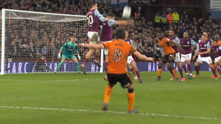 Aston Villa's Robert Snodgrass managed to avoid conceding a penalty despite an obvious handball after Ruben Neves' free-kick.