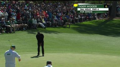 Woods' opening birdie