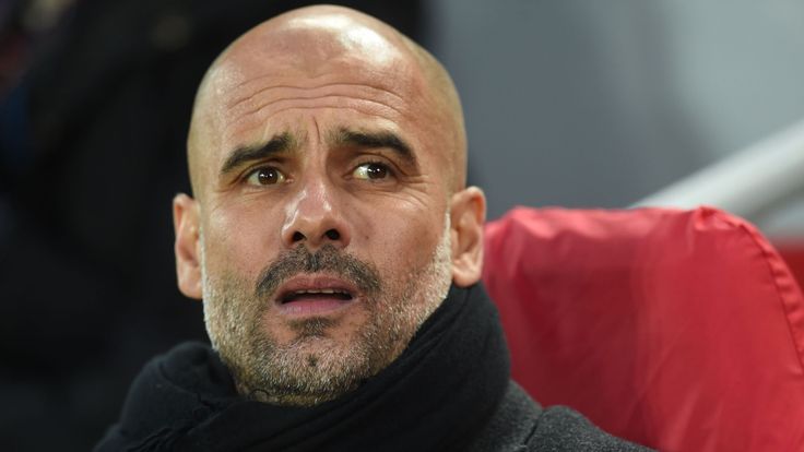 Pep Guardiola looks on during Manchester City's Champions League defeat to Liverpool at Anfield