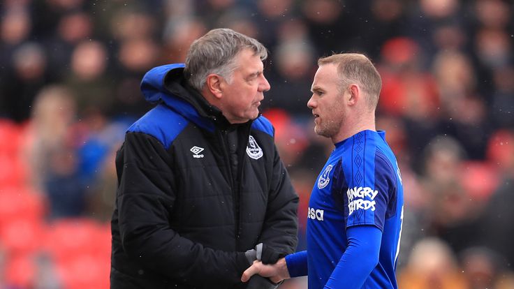 Wayne Rooney shakes hands with Everton manager Sam Allardyce as he is substituted