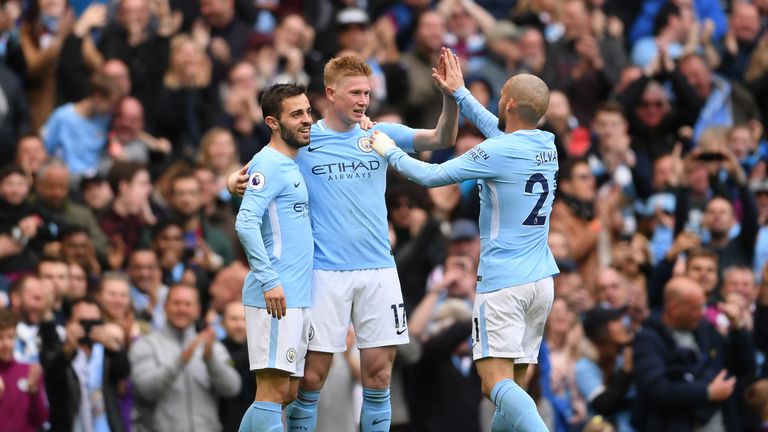 Kevin De Bruyne is congratulated after his sensational strike puts Man City 3-0 ahead