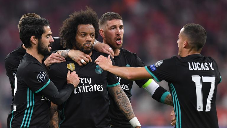 Marcelo is congratulated by team-mates after equalising for Real Madrid