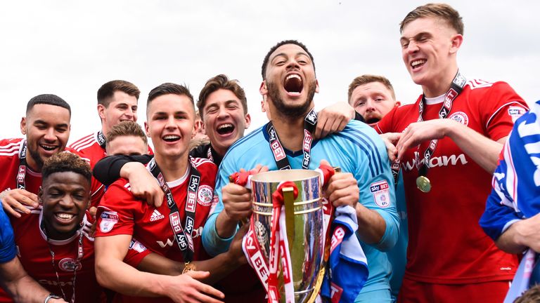 Accrington Stanley’s players celebrate after being crowned Sky Bet League Two champions (credit: Sky Bet/JMP)