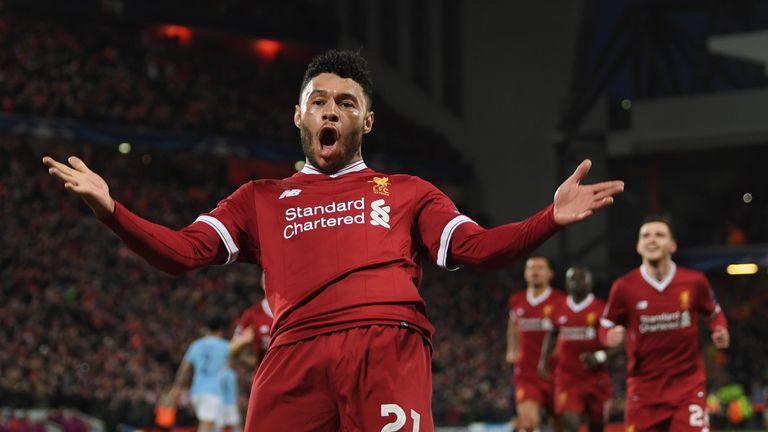 Alex Oxlade-Chamberlain celebrates after scoring Liverpool&#39;s second goal during the UEFA Champions League quarter-final, first leg against Manchester City