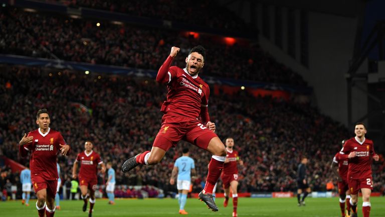 Alex Oxlade-Chamberlain celebrates after doubling Liverpool's lead during their UEFA Champions League quarter-final, first leg against Manchester City at Anfield