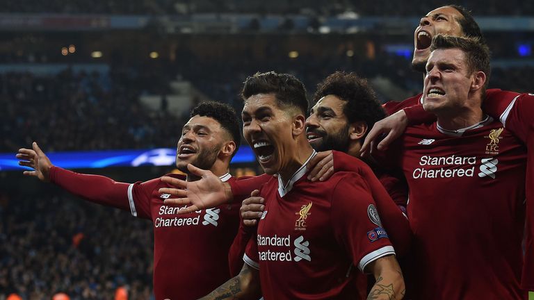 Liverpool players celebrate their goal against Manchester City in the Champions League quarter-final