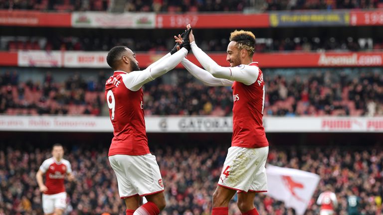 Pierre-Emerick Aubameyang and Alexandre Lacazette celebrate a goal