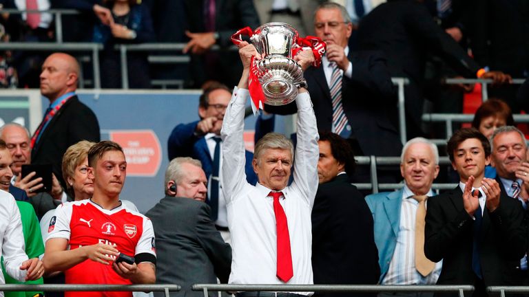 Arsene Wenger lifts trophy after Arsenal beat Chelsea in 2017 FA Cup final