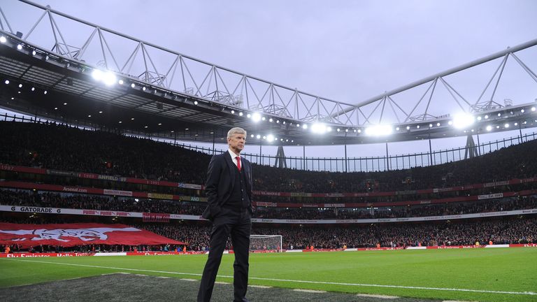 Arsene Wenger stands pitchside before the Barclays Premier League match between Arsenal and Chelsea at the Emirates Stadium on January 24, 2016