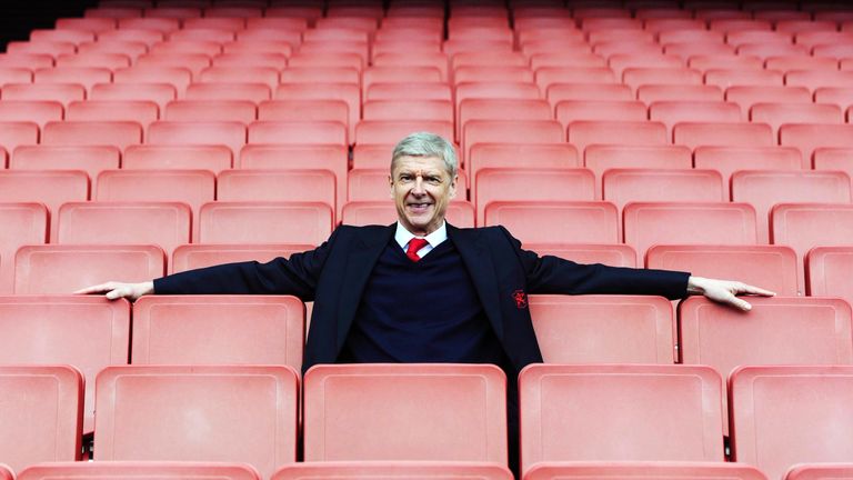 Arsene Wenger poses for a photograph after the Barclays Premier League match between Arsenal and Watford at the Emirates Stadium on April 2, 2016