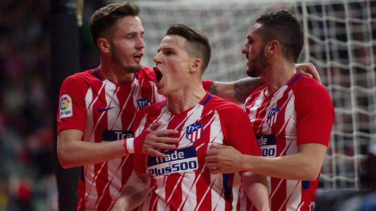 Kevin Gameiro celebrates his strike for Atletico Madrid against Deportivo