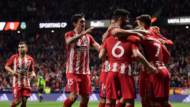 Atletico Madrid players celebrate their second goal during the UEFA Europa League quarter-final, first leg between against Sporting Lisbon at the Wanda Metropolitano Stadium on April 5, 2018