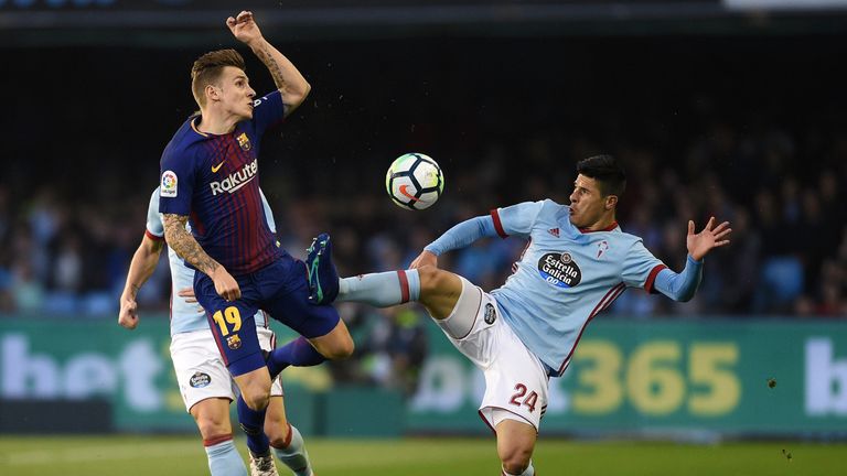  Facundo Roncaglia of Celta de Vigo competes fo the ball with Lucas Digne of Barcelona during the La Liga match between Celta de Vigo and Barcelona at Municipal Balaidos on April 17, 2018 in Vigo, Spain