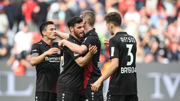Kevin Volland celebrates after scoring for Bayer Leverkusen