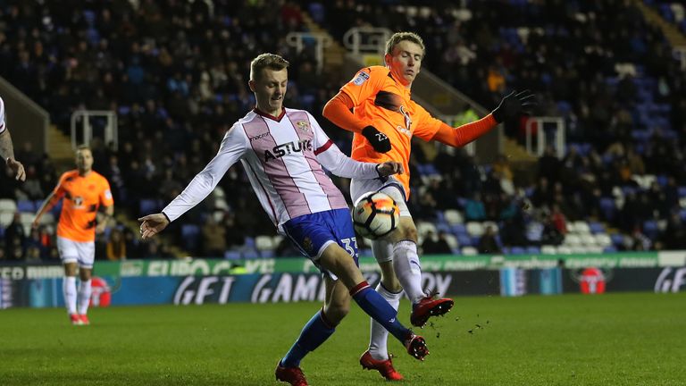 Reading's Jon Dadi Bodvarsson and Stevenage's Ben Wilmot battle for the ball