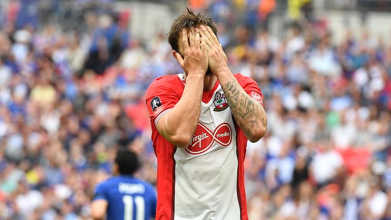 Charlie Austin reacts after missing a good chance against Chelsea