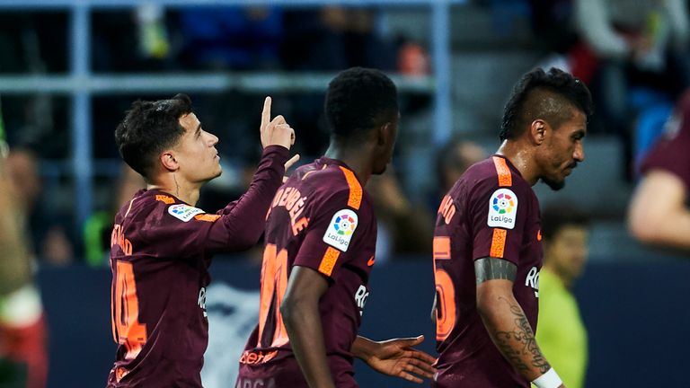  Philippe Coutinho of FC Barcelona celebrates after scoring his team's second goal during the La Liga match between Malaga and Barcelona at Estadio La Rosaleda on March 10, 2018 in Malaga, Spain