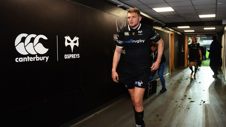 Ospreys' Dan Biggar walks back to the changing room after the game