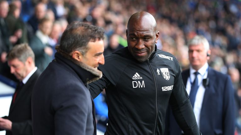West Bromwich Albion caretaker manager Darren Moore greets Carlos Carvalhal ahead of the Premier League match against Swansea City at The Hawthorns