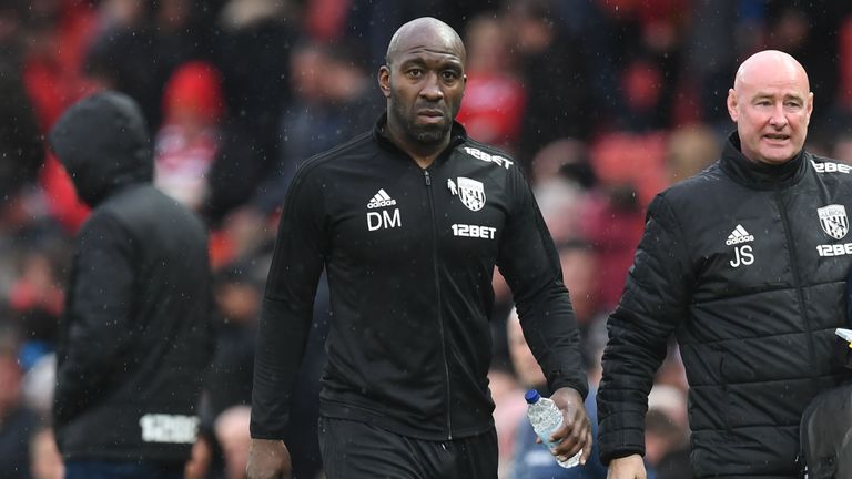 West Bromwich Albion's caretaker manager Darren Moore walks off after the full-time whistle at Old Trafford