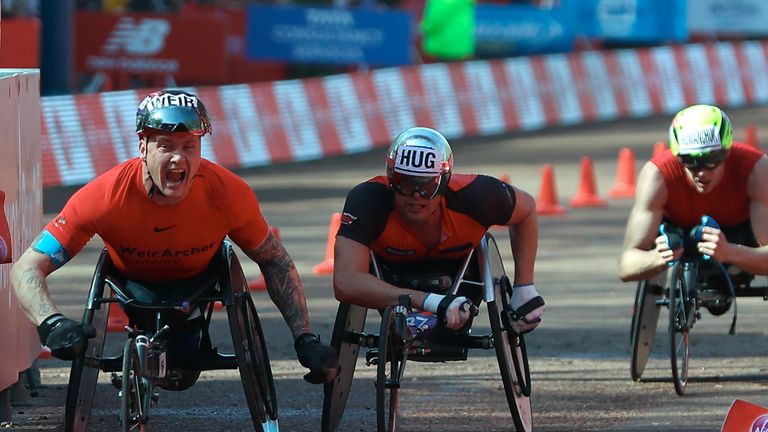 David Weir (L) beats Marcel Hug (C) and Daniel Romanchuk at the London Marathon